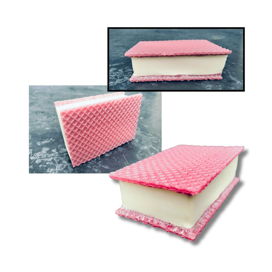 Acrylic art sculpture, three angles of an ice cream sandwich, with pink wafer and vanilla ice cream
