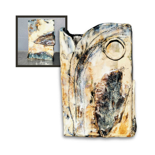 Handcrafted rectangular ceramic vase by Storm Davenport with layered clay pieces joined along the front and an earthy smooth glaze, insert top left of back view
Let me know if you’d like any tweaks!
Hand-built rectangular ceramic vase by Storm Davenport with layered clay pieces joined along the front and an earthy smooth glaze