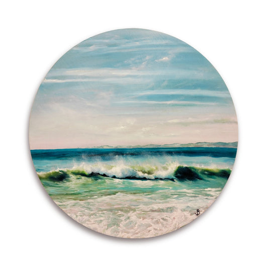 ocean painting on a round board in soft aqua and blue tones  by Bari Duncan, displayed white wall