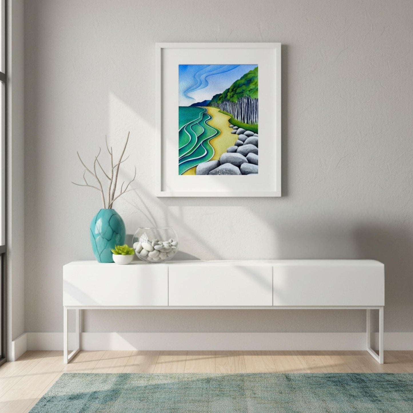 Bruce Bay watercolour by Raewyn Harris displayed in coastal living room with turquoise and green decor