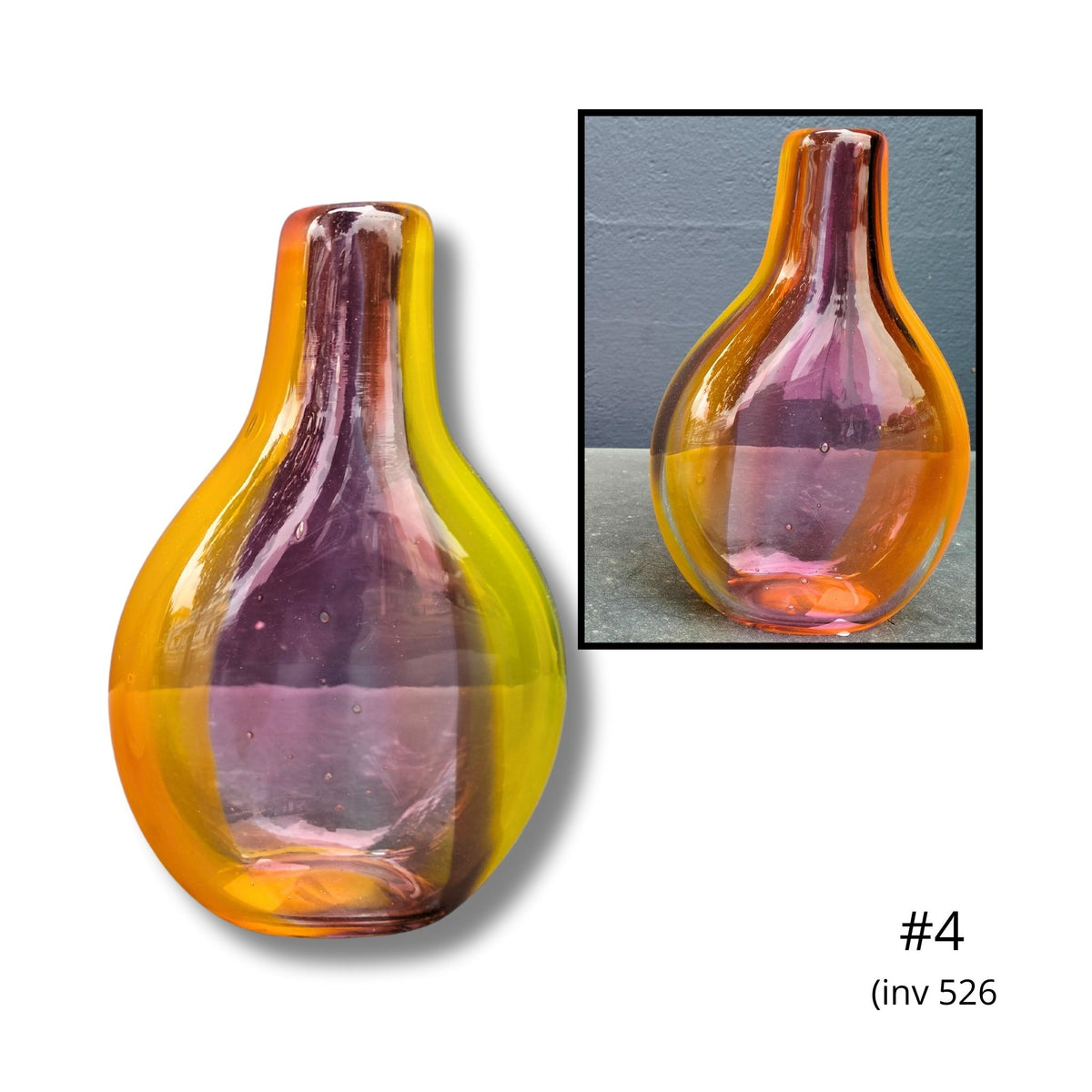 Glass vase with gradient color in a display setting