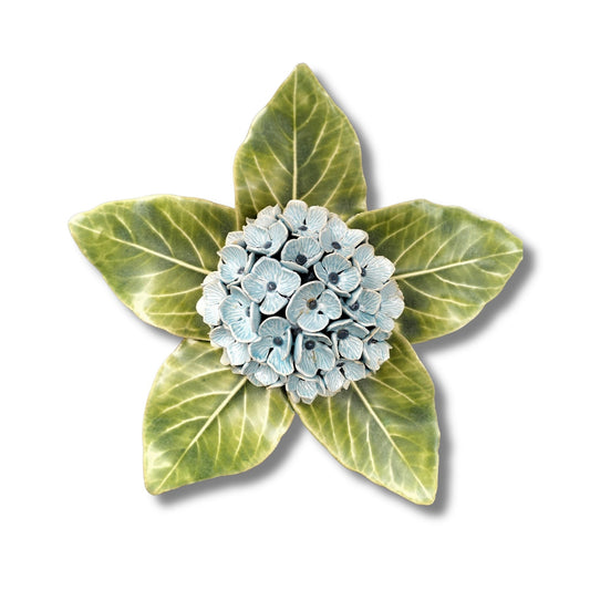 Three-dimensional ceramic Hydrangea Wall Hanging by Tom Somerville with pale blue flower cluster and glossy green leaves