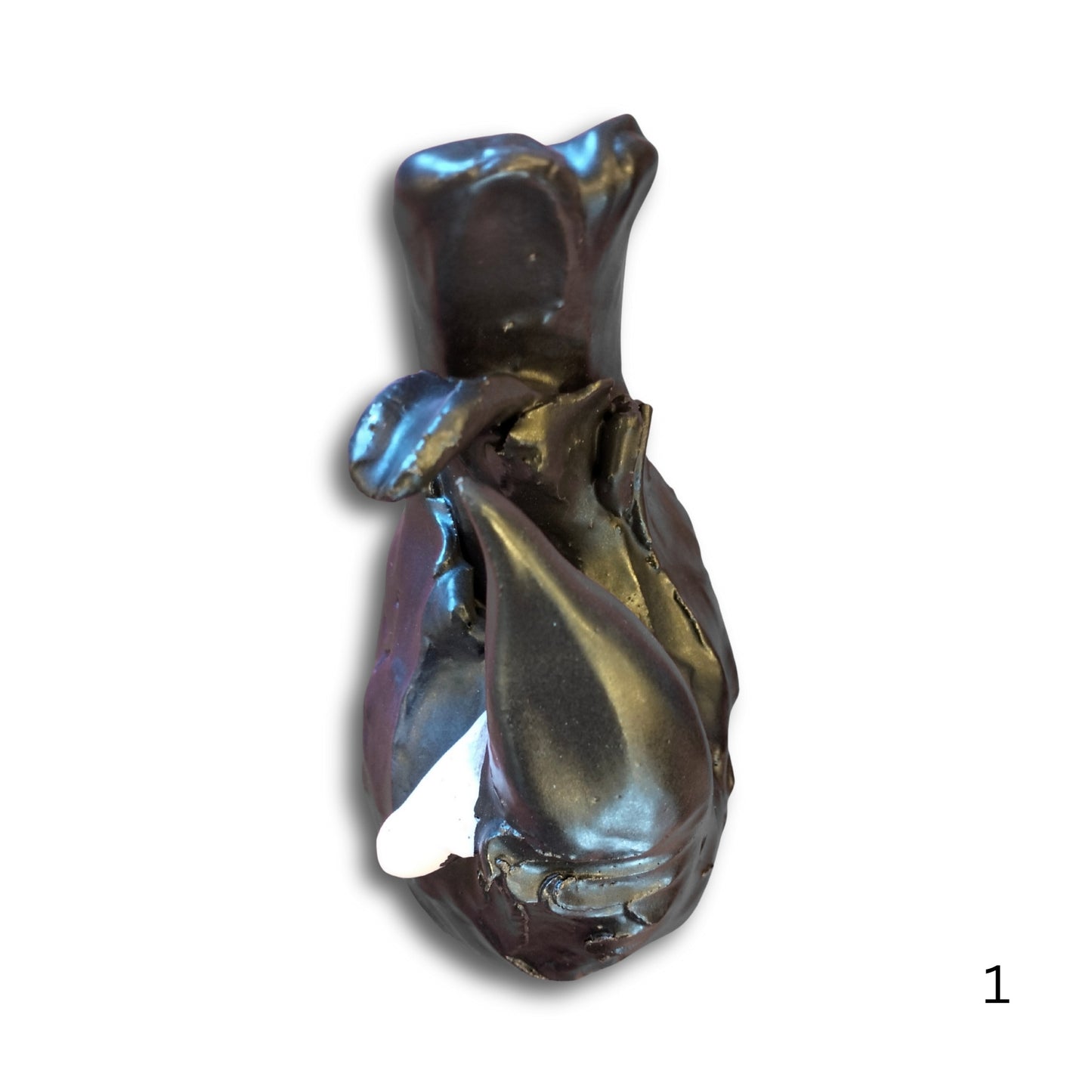 Hand-sculpted ceramic wall Tui 1 by Kylie Matheson, black glaze with white tuft, ready to hang