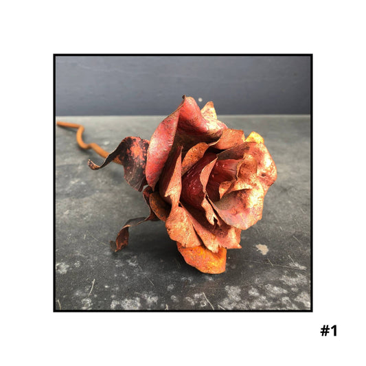Handcrafted copper rose sculpture #1with layered petals in coral and bronze tones on white background