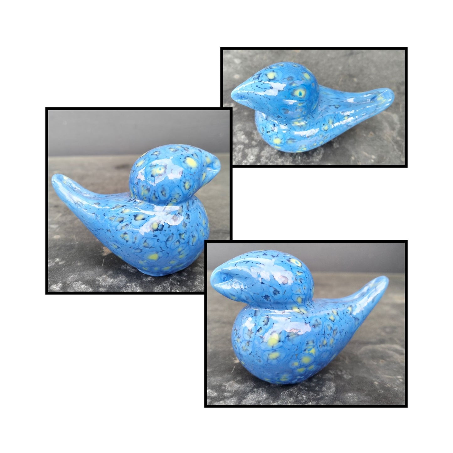 Pale blue handblown glass bird by Heather Kremen, full of light