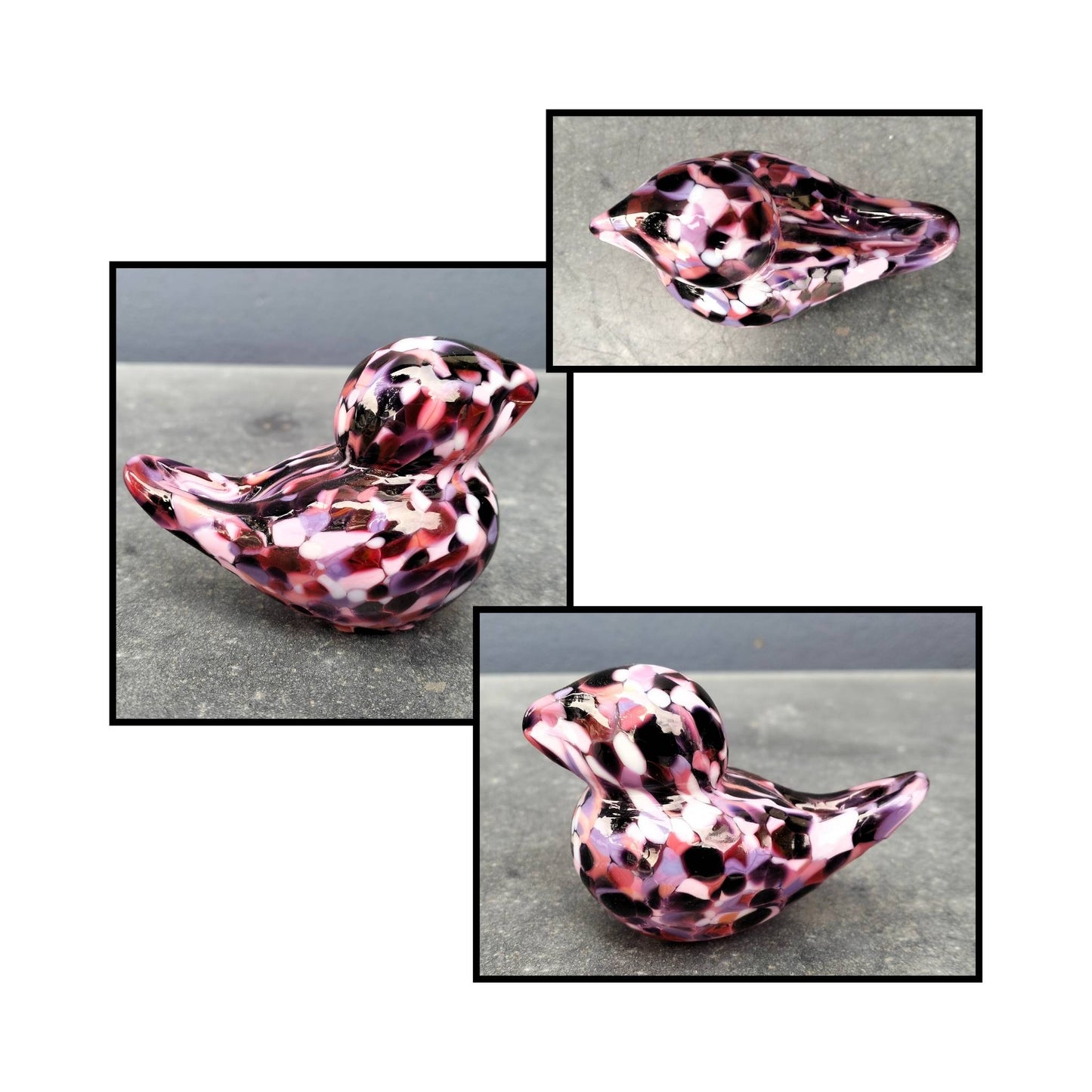 Handblown pinks and maroon spotted glass bird by Heather Kremen with smooth curves and glossy finish