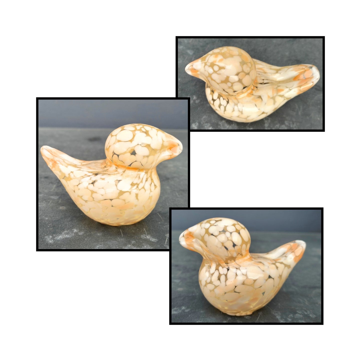 Handblown pale peach glass bird by Heather Kremen with smooth curves and glossy finish