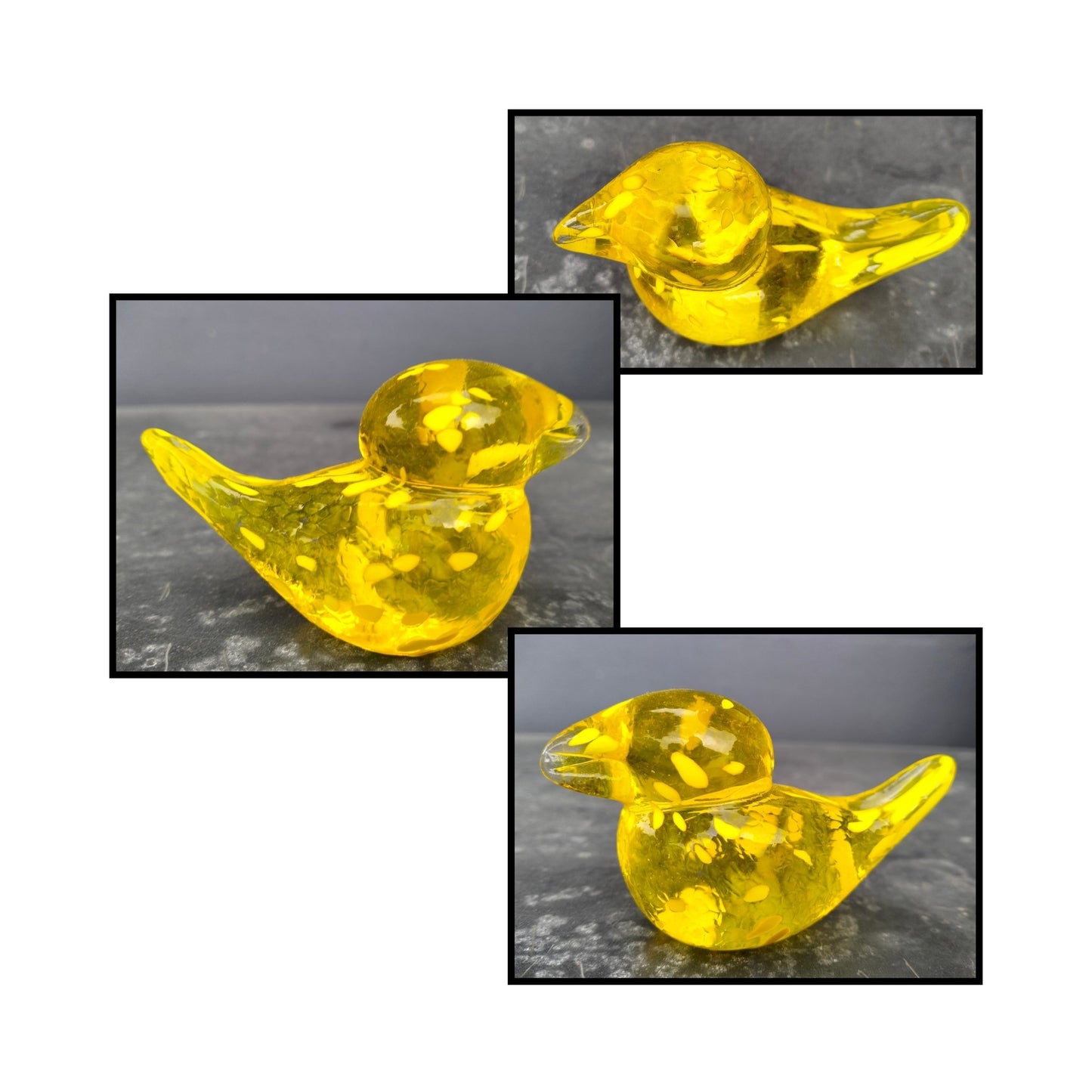 Yellow and amber-toned glass bird sculpture by NZ artist Heather Kremen.