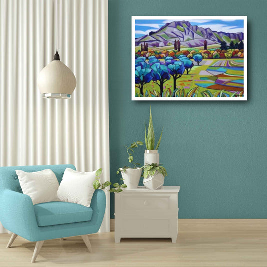 Olives in the Valley painting by Helena Verhaaren showing a colourful landscape with olive trees, patchwork farmland, and Te Mata Peak in the background in a mockup living room
