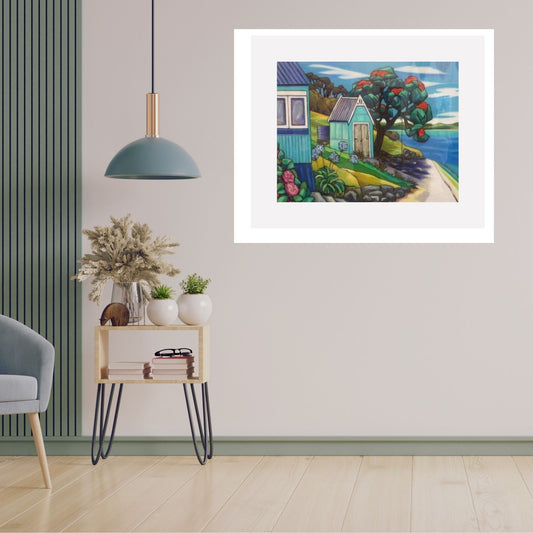 Helena Verhaaren painting of a coastal bach with pink flowers, pohutukawa tree, and sea view in lifestyle mockup