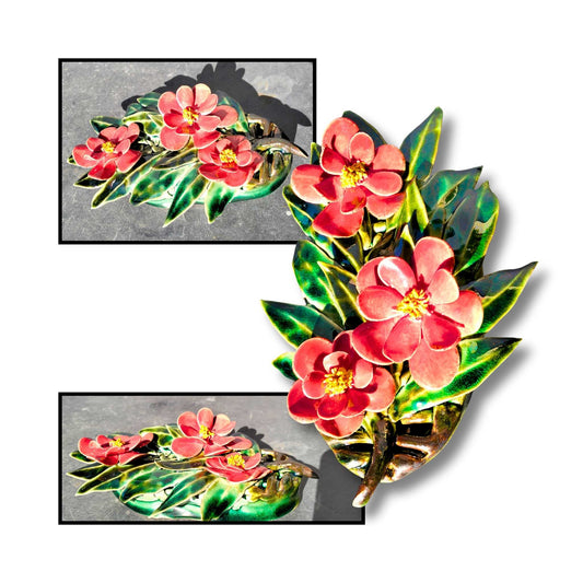 Large red triple camellia ceramic with sculpted green leaves and glossy glaze.
