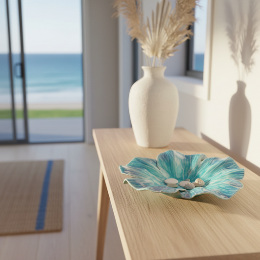 Hibiscus Plate by Tom Somerville in turquoise styled in contemporary home with natural light and coastal aesthetic