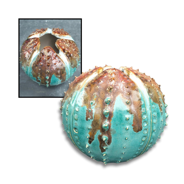 Turquoise and bronze glazed ceramic kina by artist Chloe Foster