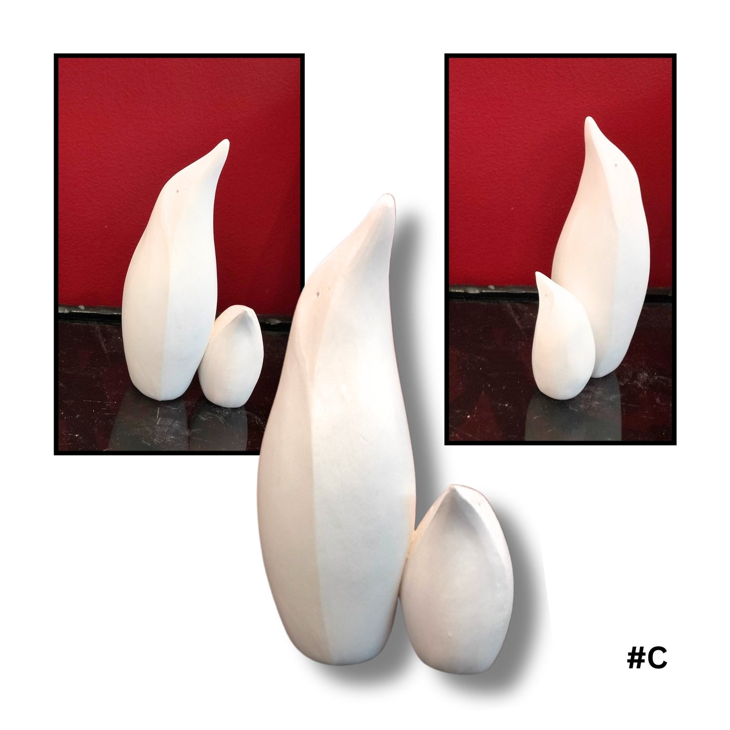 Mother and child White Earthenware Clay Penguin sculpture C, showing three views on a reflective surface with red background