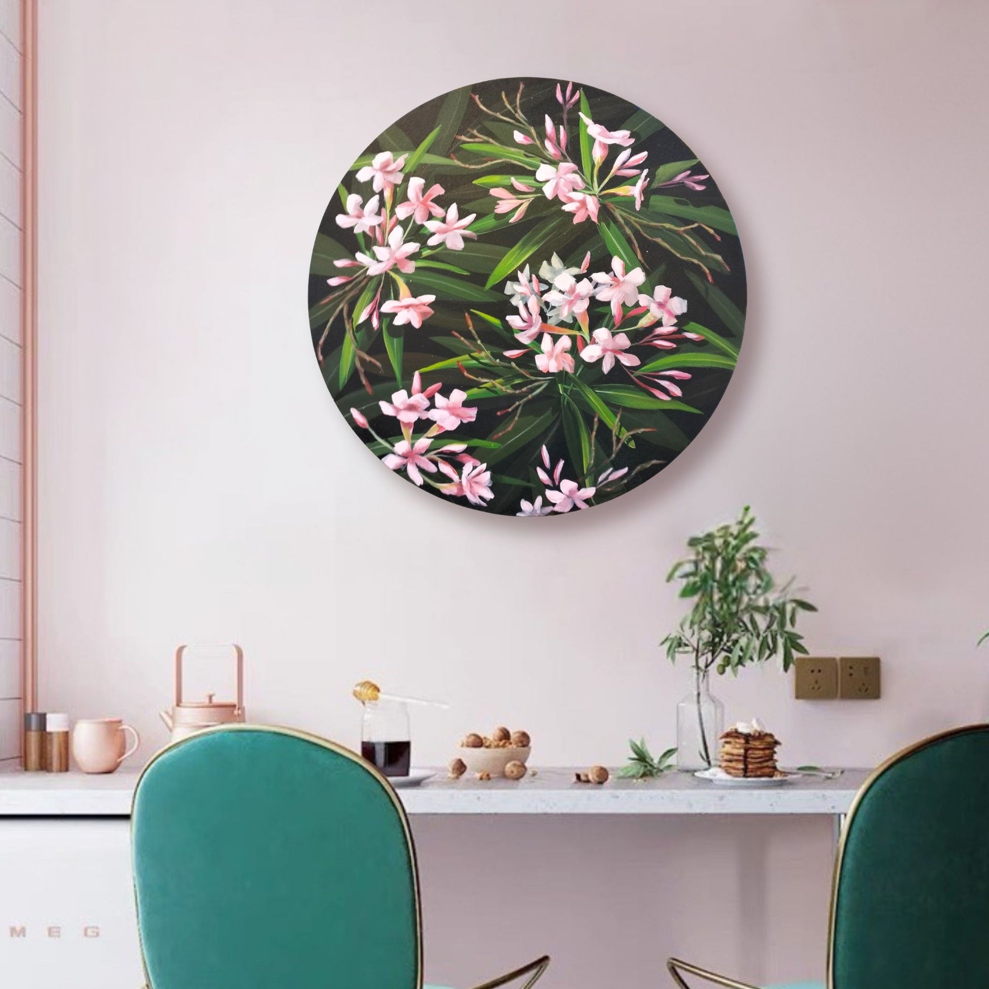 Deception floral painting by Susan Vorster – soft pink flower with lush foliage in a styled room
