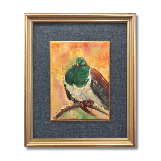 Kererū at Rest, original oil on canvas by Jane McIntosh, NZ wood pigeon perched on branch with teal plumage against warm golden background, gold frame
