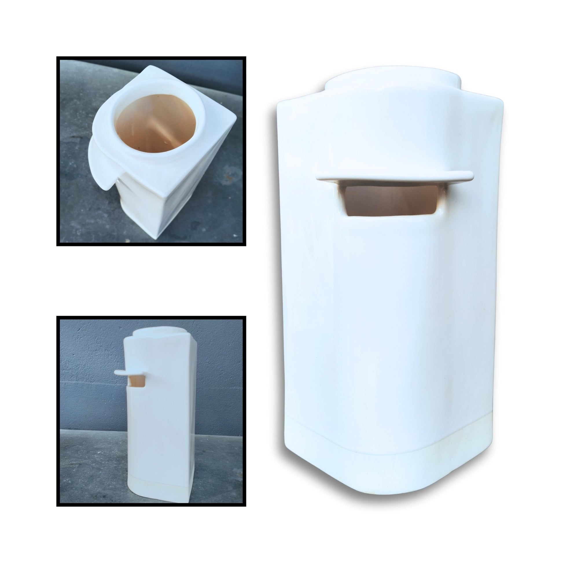Glossy white slab-built corner vase with curved front edge and letterbox-style cut-out, handcrafted by Greg Melville.