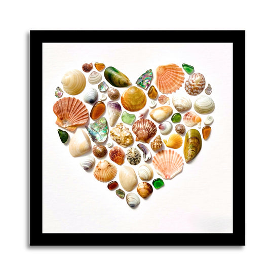 Heart-shaped sea glass and shell mosaic by Steffi Tregenna in soft greens, peach, and blues, framed in pale wood, titled NZ Sea Treasures Heart III.