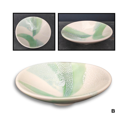 Brian Gartside B150  #B ceramic bowl featuring soft white glaze with turquoise, accents in organic flowing pattern