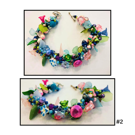 Beaded bracelet in the pink and blue shades by artist Nola Weber.