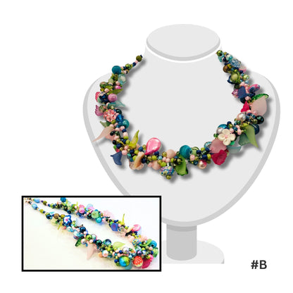 Beaded necklace in inks and blues by artist Judith Bradley on a white mannequin and close upl