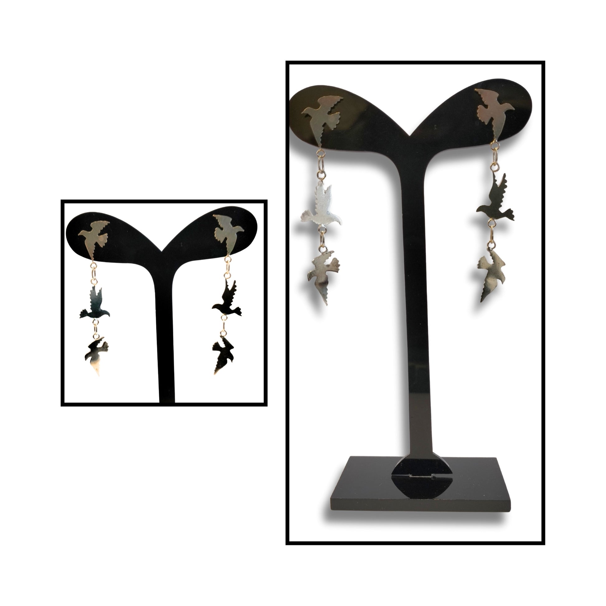 Sterling silver dangle earrings with three sculpted bird silhouettes by Kim Jobson, linked in a delicate vertical chain.

