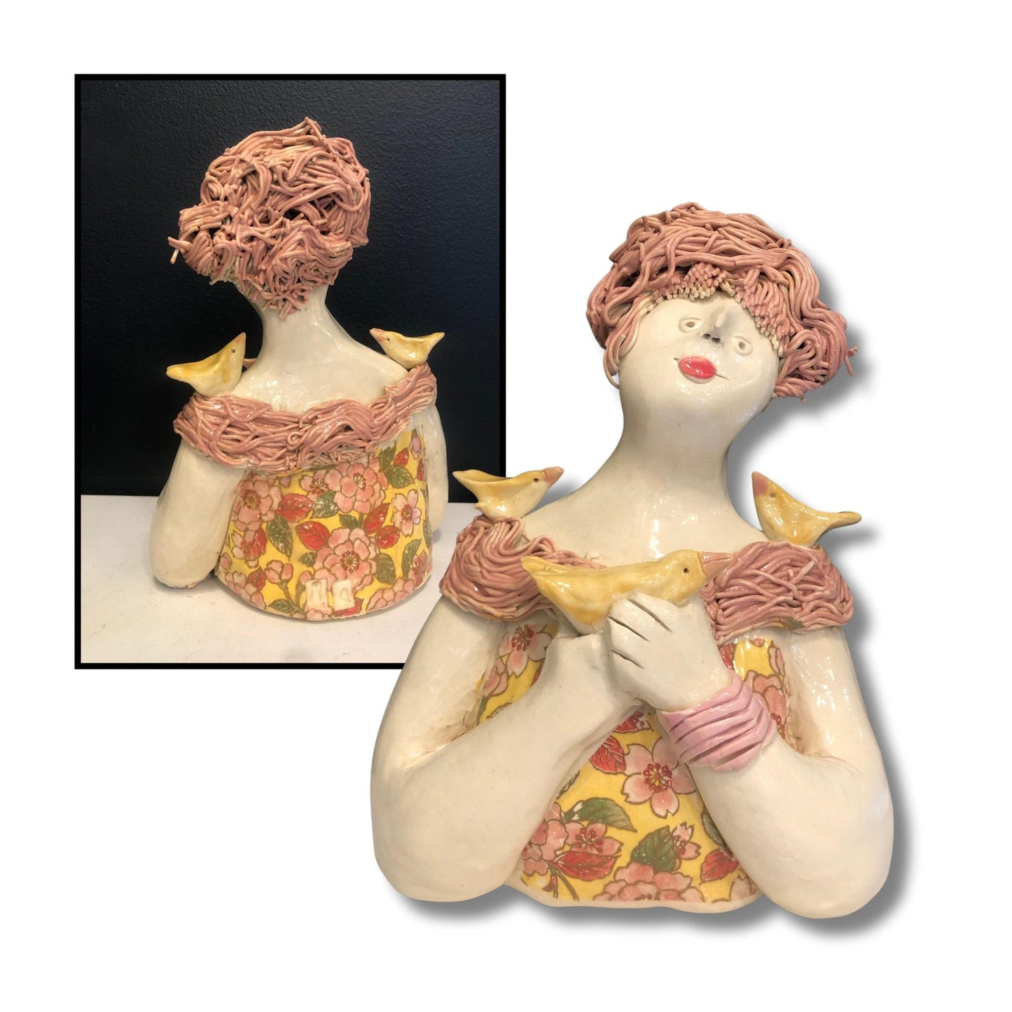 Hand-craftedceramic sculpture of woman with textured pink hair holding yellow bird, featuring floral patterned dress