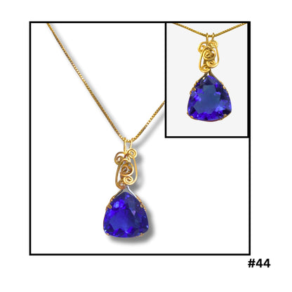 blue topaz with hand wound filagree pendant
