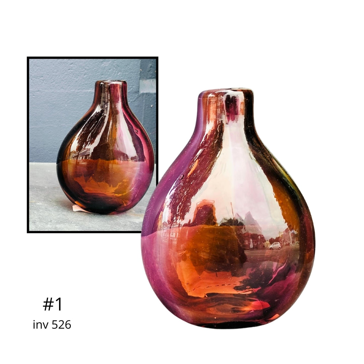 Multicolored glass vase with a smaller inset image on a white background