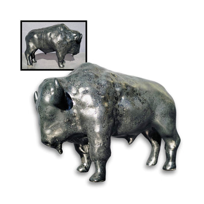 Side views of Storm Davenport’s handcrafted ceramic buffalo sculpture highlighting the three-dimensional form and layered black glaze finish.

