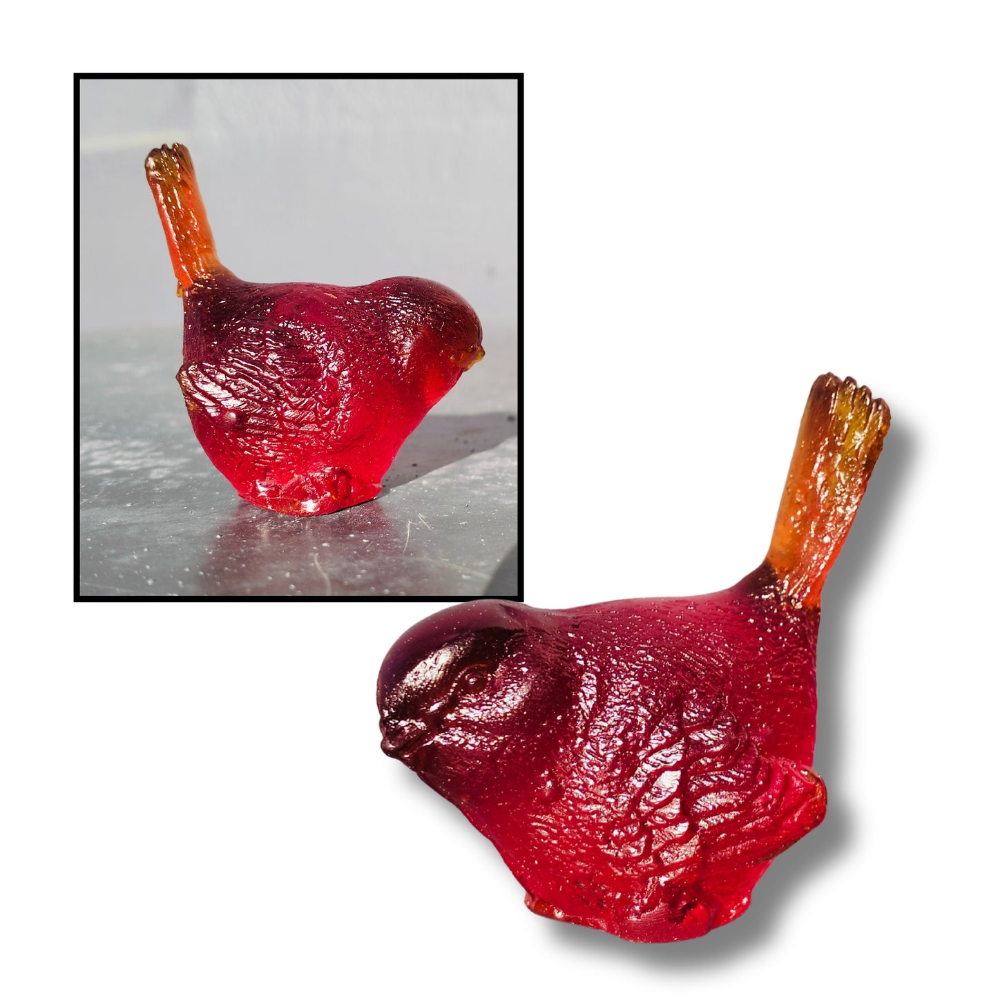 Small cast glass bird sculpture in burnt red with tail up by Lou Mathieson, 5x4x5cm, on white background
