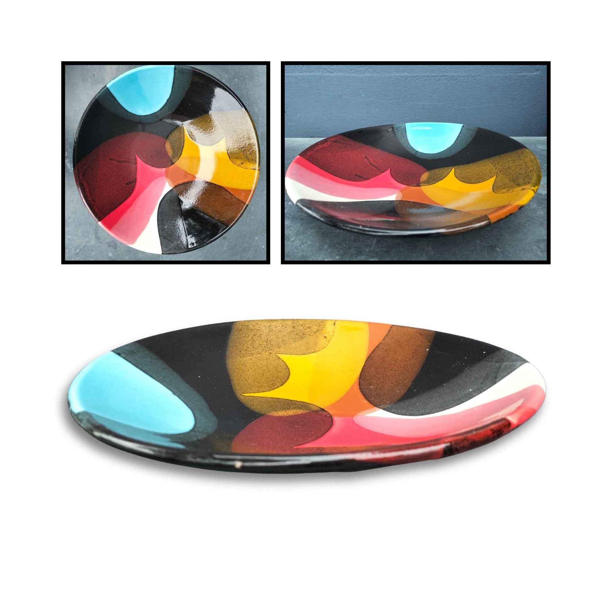 Large handmade ceramic bowl by Brian Gartside with layered abstract glaze in blue, red, white, black, yellow, and brown.