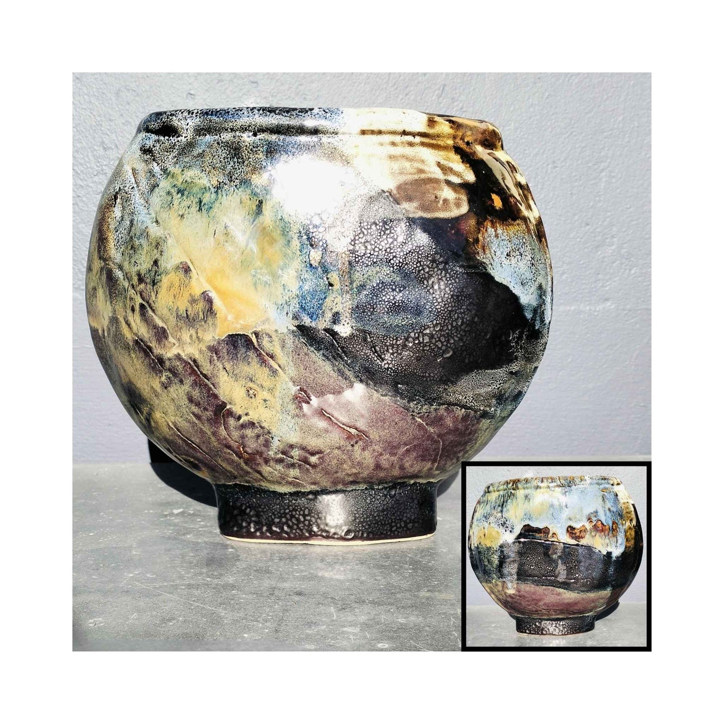 Ceramic vase by Storm Davenport with rounded asymmetric form and layered black, blue, and earthy glaze in an abstract design insert of opposite side