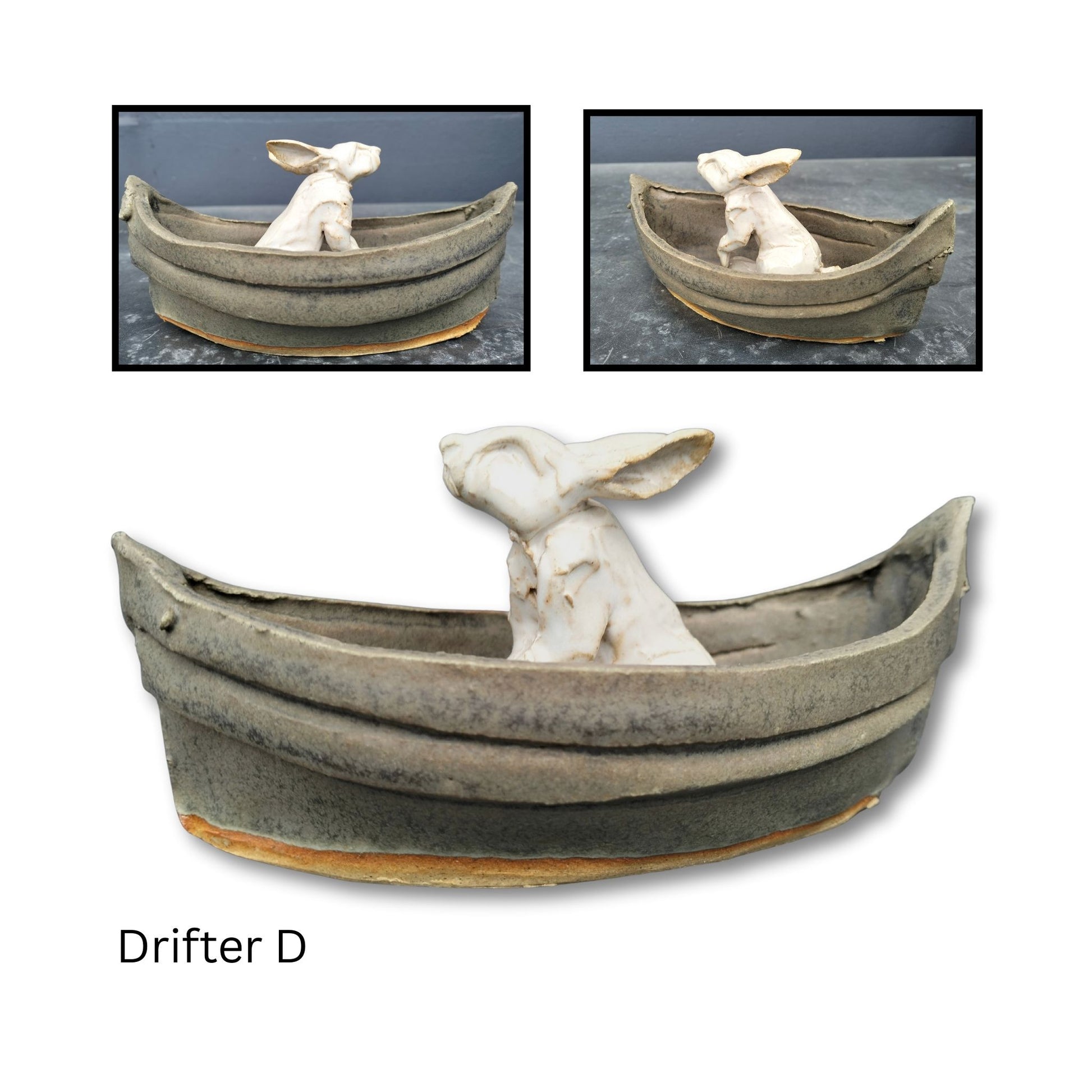 White ceramic rabbit in boat peeking shyly over the side of rim.
