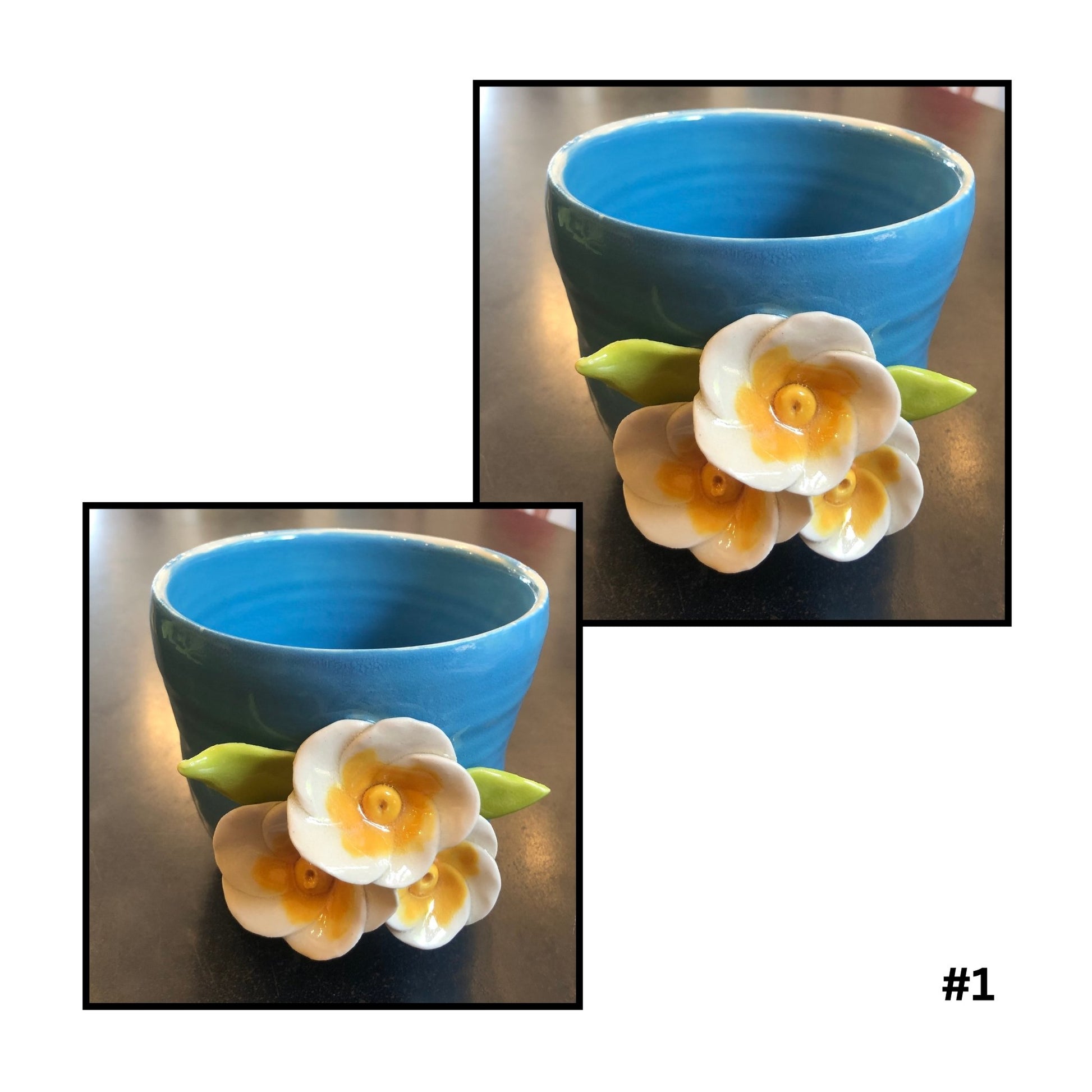Two blue ceramic bowls with floral decorations on a reflective surface.