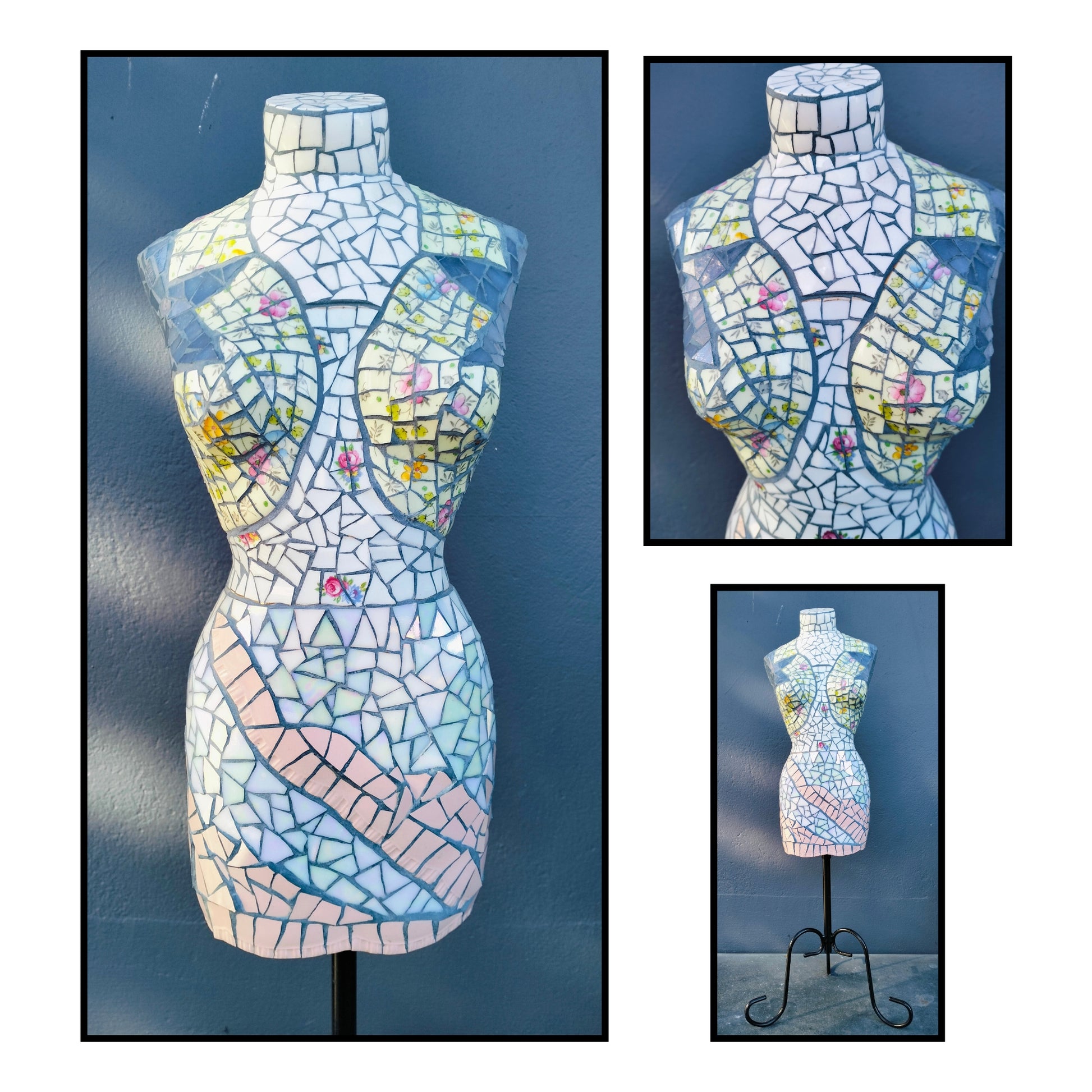 Mosaic female torso sculpture by Janice Corbishley, covered in broken iridescent vintage china plates and cups with floral fragments and dark grout, on black stand
