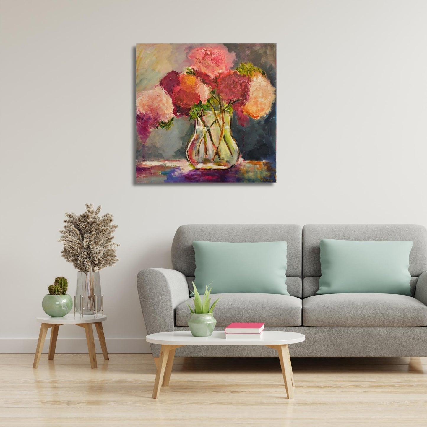 Square floral painting of pink and white flowers in a glass jar by Jenny Bishop in home setting
