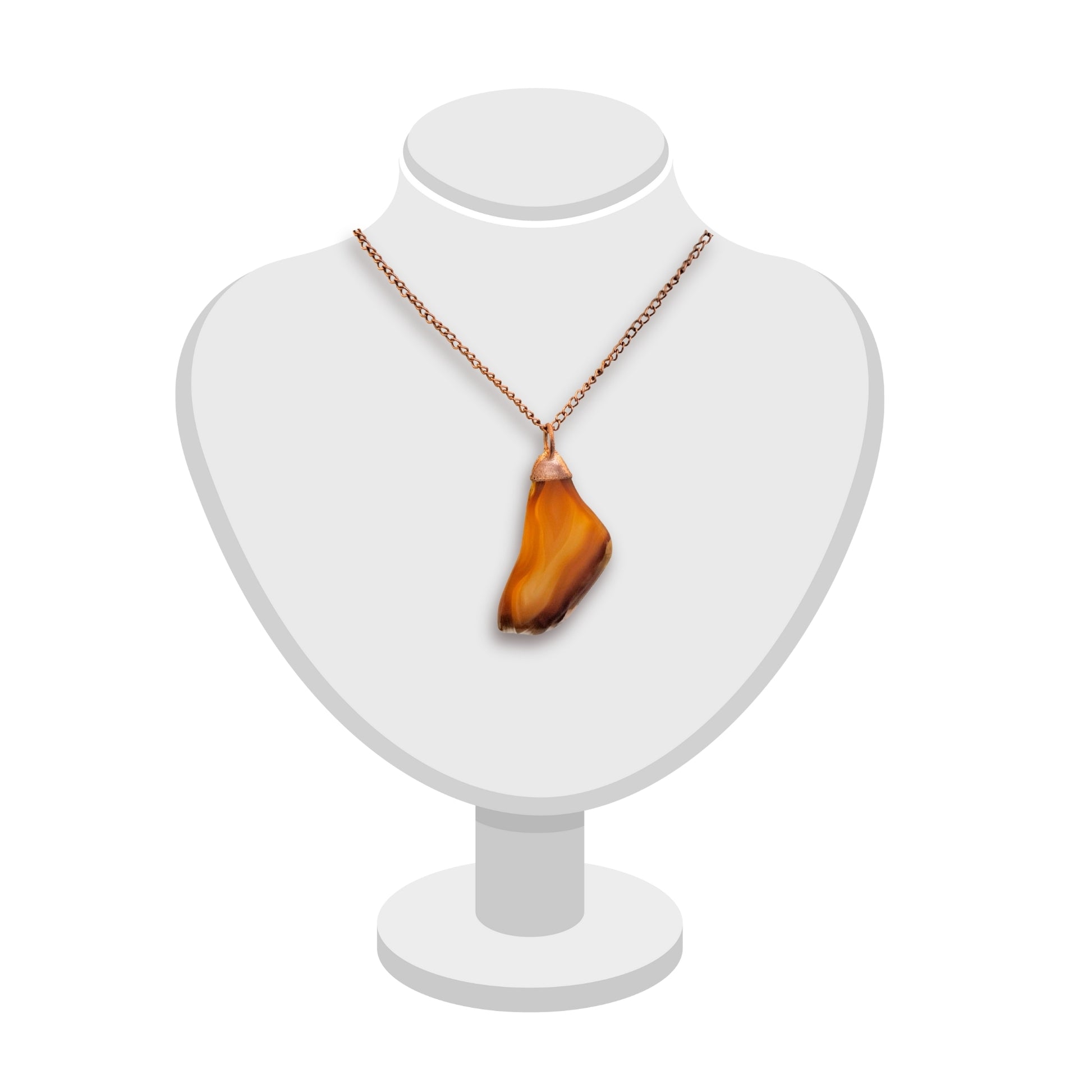 Carnelian agate pendant in warm amber tones with copper bail by Gary Howse, shown on a jewellery bust.