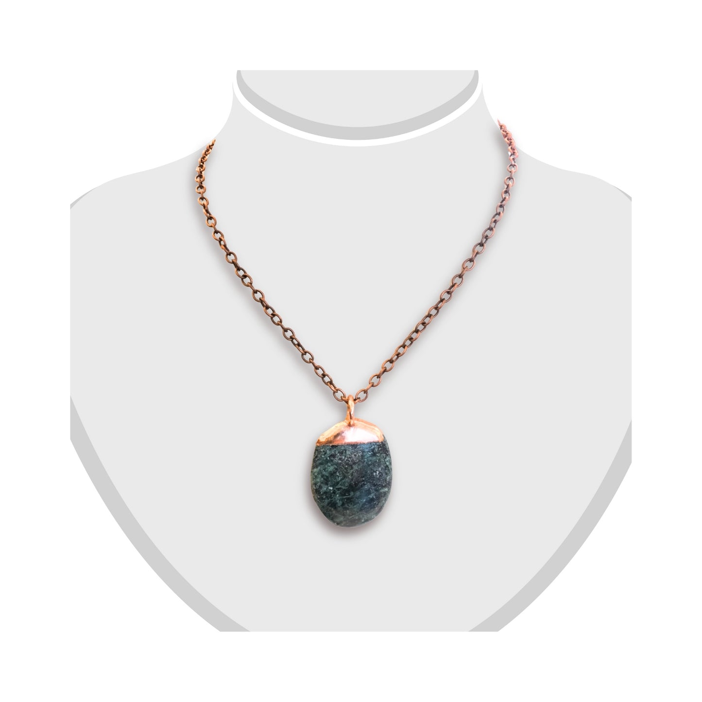 Greenstone pendant capped with smooth copper, displayed on a white bust.
