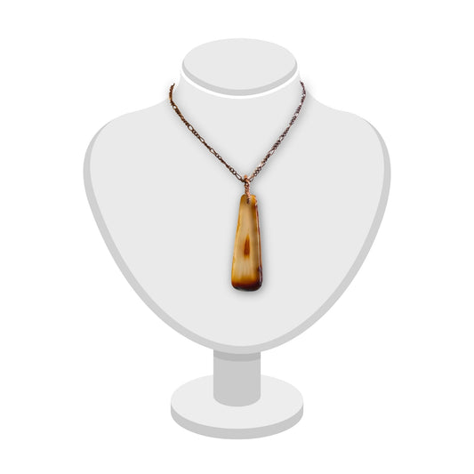 Carnelian Agate Pendant in copper by Gary Howse – handcrafted jewellery displayed on a white bust on white background