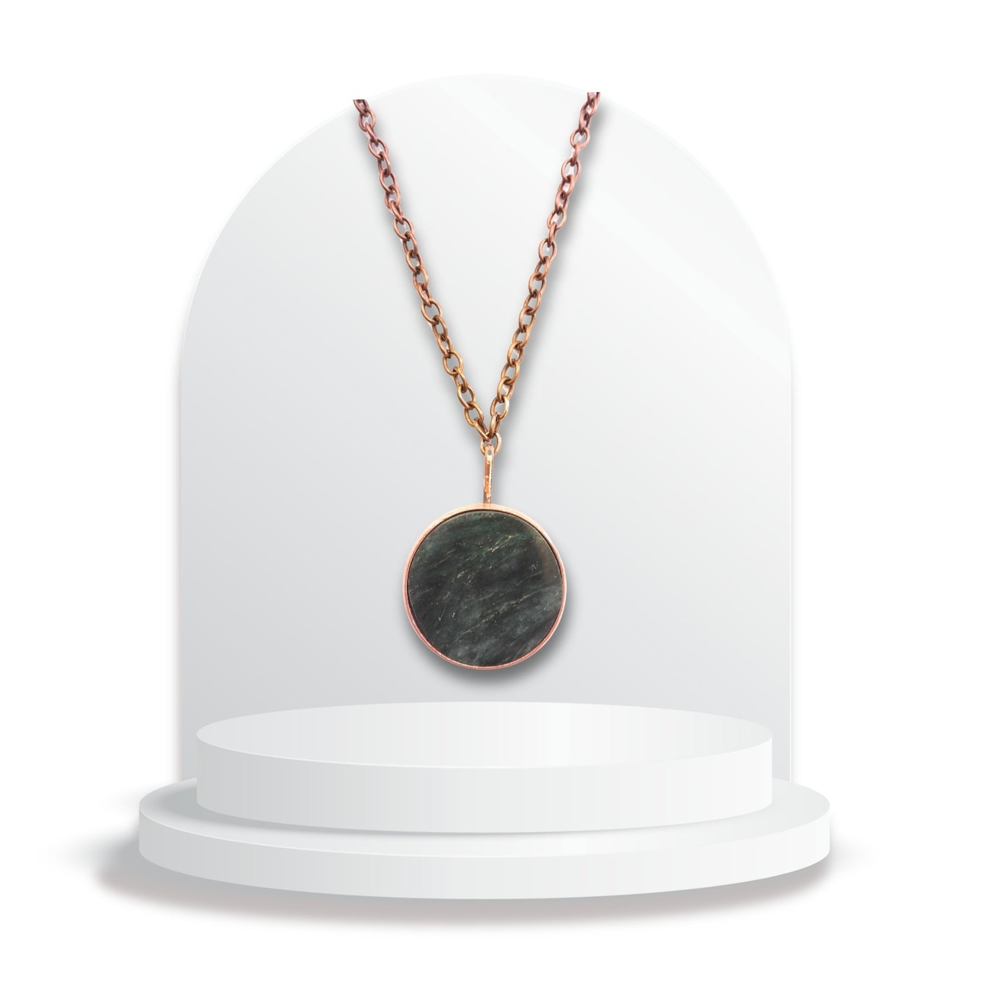 Round greenstone pendant with copper ring setting by Gary Howse on chain.