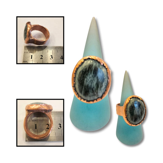 Multiple views and angles of handmade greenstone and copper ring with a rugged bezel edge.
