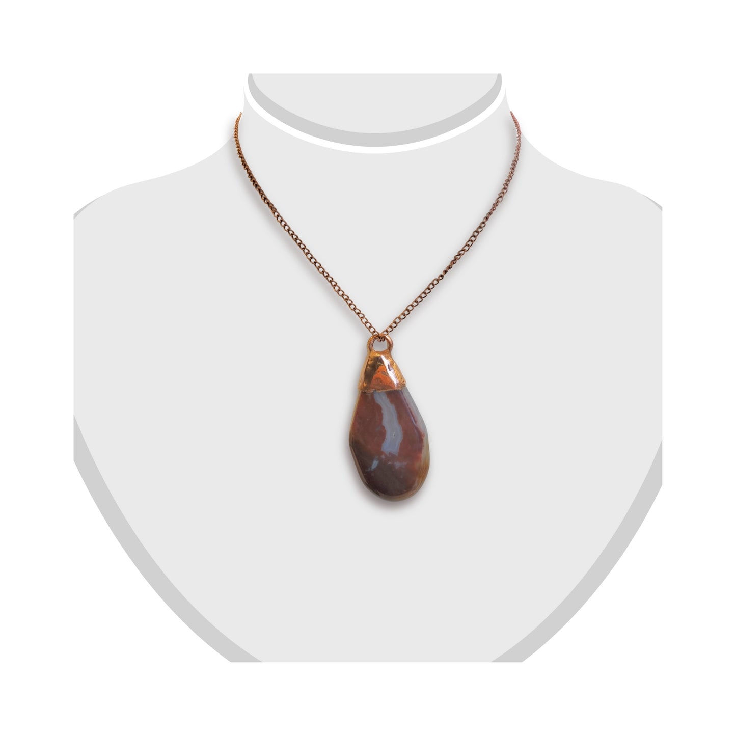 Handmade jasper agate pendant with copper cap displayed on a white bust.