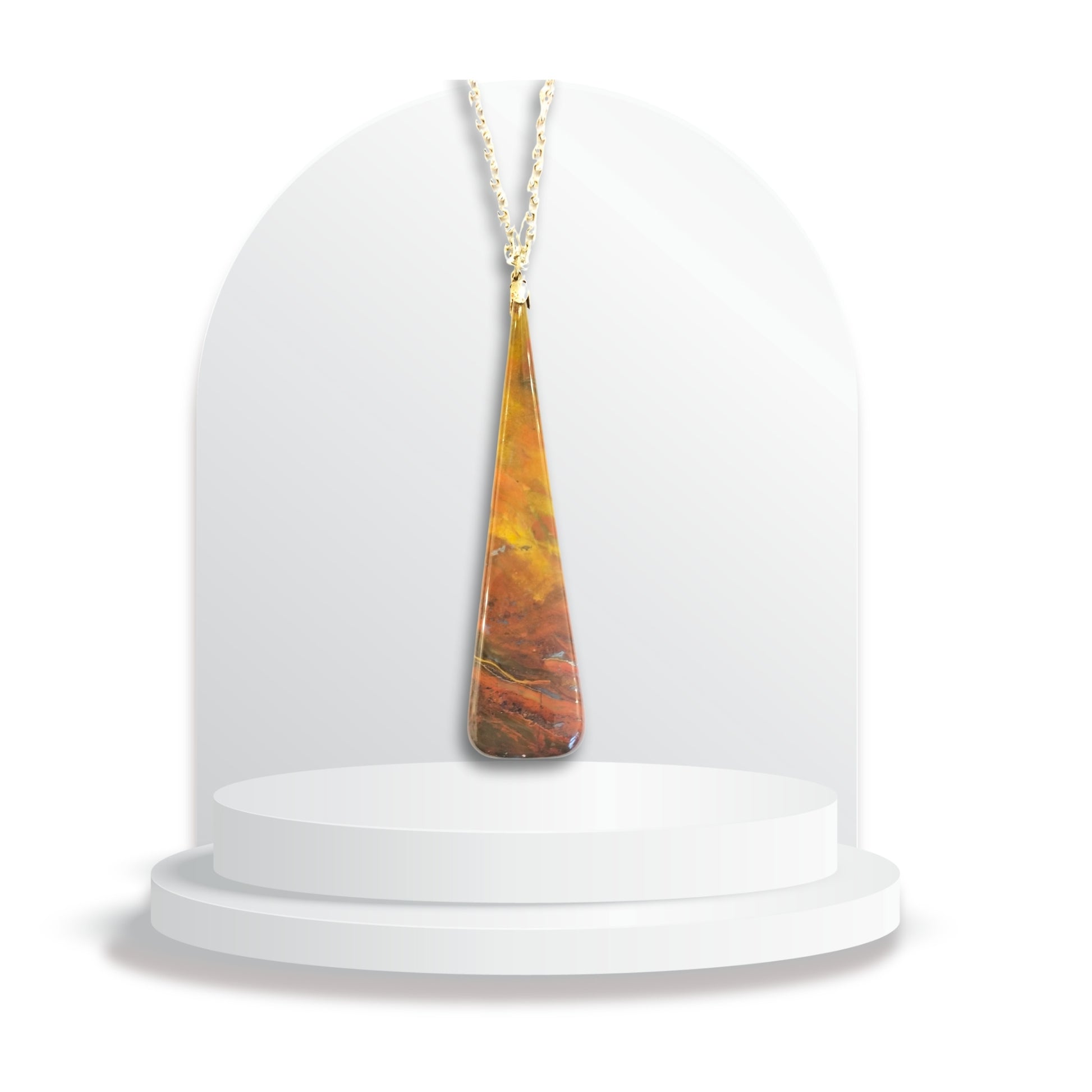 Handmade jasper pendant by Gary Howse with tapered triangular shape on copper chain on jewellery stand