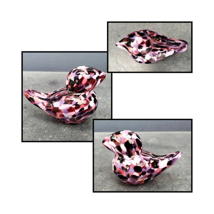 Handblown  pinks and maroon spotted glass bird by Heather Kremen with smooth curves and glossy finish
