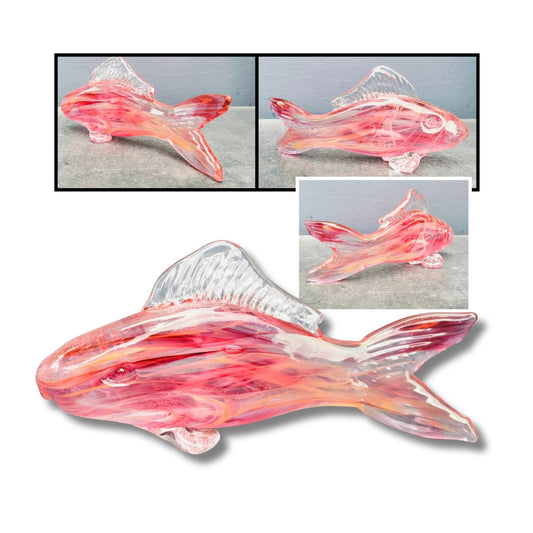 Multiple angles of a glass fish sculpture in pink and clear colors with inset images on a white background