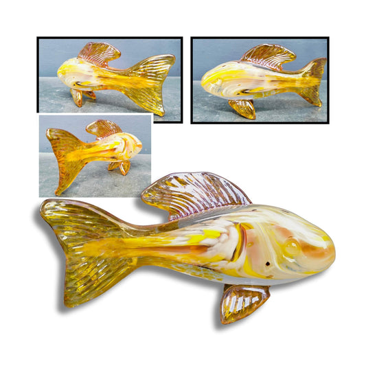 Multiple angles of a glass fish sculpture with yellow and brown colors on a white background