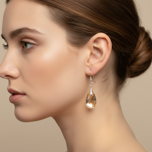 Golden shadow crystal earrings on model product shot