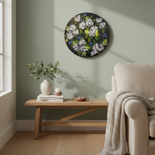 Living room with a floral wall art piece, wooden coffee table, and beige sofa.