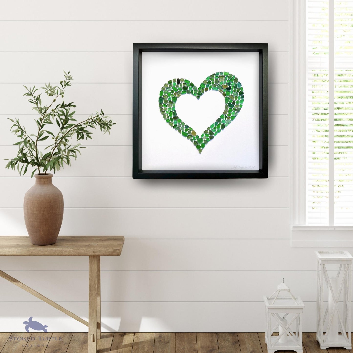 Framed Green Sea Glass Heart by Steffi Tregenna adding warmth, love, and coastal calm to a modern home interior